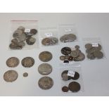 A collection of foreign coins, including two France five francs, comprising 1867 and 1873, a USA