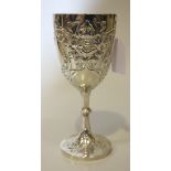 An Art Nouveau silver goblet, the ovoid bowl chased and embossed with naturalistic flowerheads and