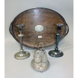 A plated and oak oval two handled tea tray with pierced gallery and beaded rim, on bun feet, a