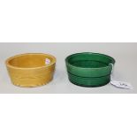 A pair of Chinese pottery brush washers, 18th/19th Century, one green glazed, the other yellow, both