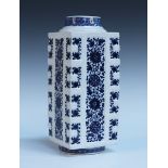 A Chinese blue and white soft paste porcelain cong vase, Qianlong period, each side painted with a