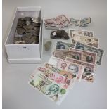 A collection of British and foreign coins, including a George I shilling 1723SSC, a Victoria Young