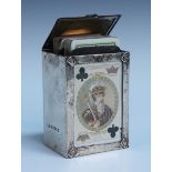 An Edwardian silver playing card box of rectangular form, the bevelled glass front and back inset