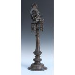 A 19th Century Indian cast bronze column censer, the surmount modelled as Ganesh seated in front