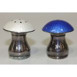 A pair of Danish sterling and enamel mushroom pepper and salt casters, height approx 4.5cm.