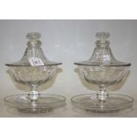 A pair of cut glass bonbon dishes, covers and stands, early 20th Century, of Baccarat type, the