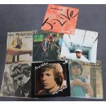 A collection of LP records and singles, including albums by Scott Walker, The Hollies and The