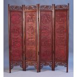 A Chinese red lacquer and hardwood four fold screen, mark of Xuande but 19th Century, each red