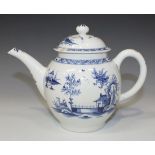 An English porcelain teapot and cover, probably Lowestoft, circa 1765, the globular body with