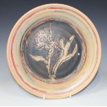 A Quentin Bell Fulham pottery circular dish, mid-20th Century, the brown washed centre incised