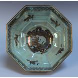 A Wedgwood lustre octagonal bowl, designed by Daisy Makeig-Jones, the exterior gilt with dragons