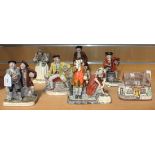 A group of seven Devon pottery figure groups, 1970s, including smugglers, fisherwoman and a cottage,