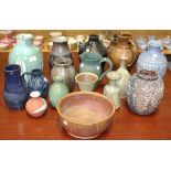A large group of assorted studio and decorative pottery, including vases and jugs, together with a