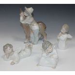 A Lladro porcelain figure Platero and Marcelino, No. 1181, boxed, and three Lladro porcelain figures