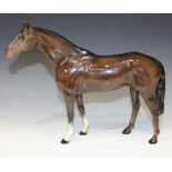 A Beswick brown gloss large racehorse, model No. 1564, height approx 28cm.