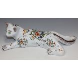 A Rouen faience wall pocket in the form of a cat, mid-20th Century, painted with flowers and inset