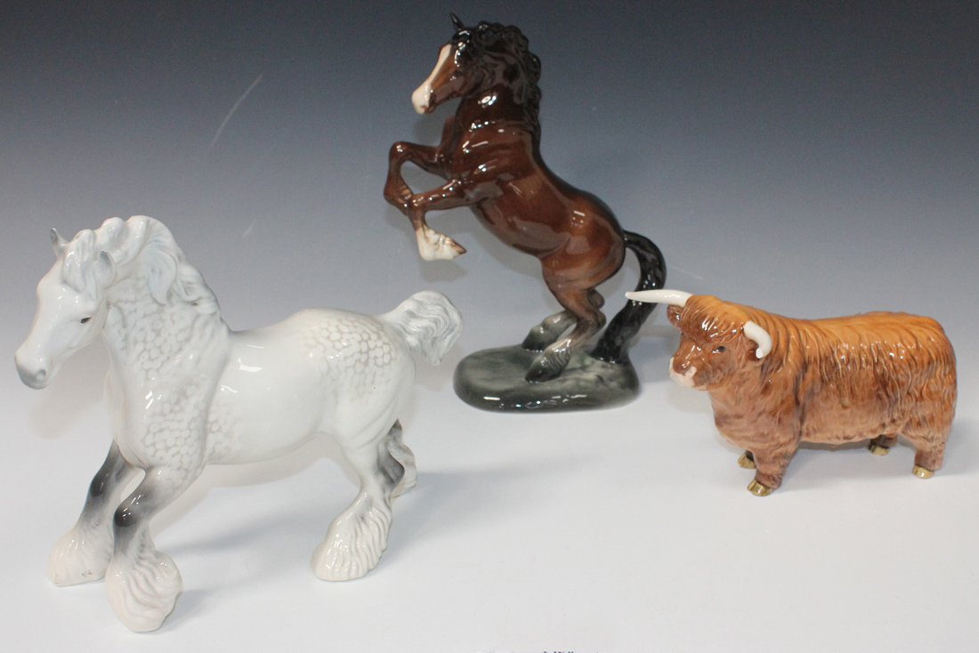 A Beswick Cantering Shire horse, model No. 975, a Beswick Welsh Cob rearing, first version, model