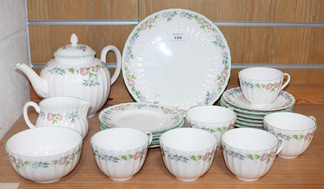 A Royal Worcester 'English Garden' pattern part tea set, comprising teapot and cover, six cups,