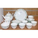 A Royal Worcester 'English Garden' pattern part tea set, comprising teapot and cover, six cups,