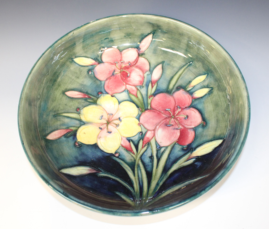 A Moorcroft pottery Freesia pattern circular bowl, 1928-49, the base interior decorated with a spray