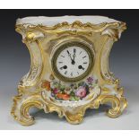 A French porcelain mantel timepiece, mid-19th Century, the circular dial with Roman numerals, the