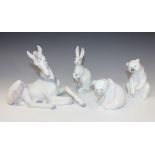 A Lladro porcelain model of Little Unicorn, No. 5826, together with three other Lladro porcelain