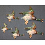 A graduated set of five Czechoslovakian pottery flying duck wall plaques, 20th Century, lengths