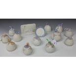 Four Lladro porcelain Christmas Balls, a collection of eight Lladro porcelain Christmas Bells, a