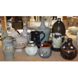 A group of assorted studio pottery, mostly stoneware, including vases, jugs and bowls, together with