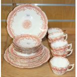 A Wileman & Co. Foley China part tea service, printed in red with flowers to the rims, comprising