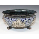 A Doulton Lambeth stoneware bowl by George Tinworth and Louisa E. Edwards, late 19th Century, of