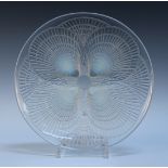An Art Deco Lalique Coquilles opalescent glass circular dish, the underside moulded in relief with