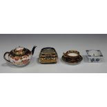 Three Royal Crown Derby Japan pattern miniatures, comprising a teacup and saucer and basket, both