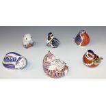 Three Royal Crown Derby Imari animal paperweights, each with gilt stopper to base, comprising a