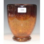 A Monart style glass vase, circa 1930, of ovoid form with circular foot, with mottled amber and