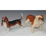 Two Beswick dogs, comprising Basset Hound 'Fochno Trinket', model No. 2045A, and Bulldog 'Basford