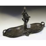 A late 20th Century Art Nouveau style brown patinated cast bronze centrepiece with a pair of oval