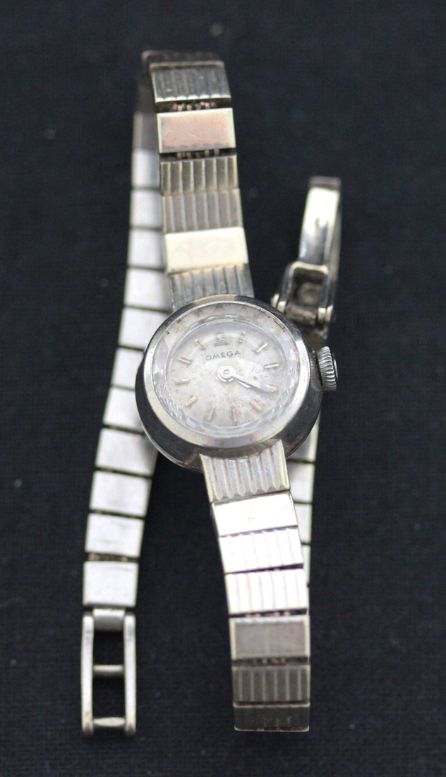 An Omega 9ct white gold lady's bracelet wristwatch, the signed circular silvered dial with baton - Image 2 of 2