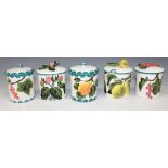 A group of five Griselda Hill pottery (Wemyss) cylindrical preserve jars and covers, painted with