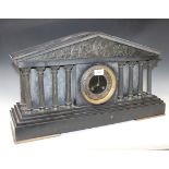A large late 19th Century French slate mantel clock with eight day movement striking on a gong,