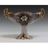A Carlton Ware Explosion pattern two handled pedestal bowl, the lobed oval body painted and gilt