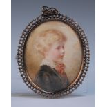 E.T., British School - Oval Miniature Portrait of a Child, watercolour on ivory, signed with