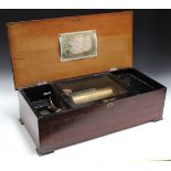 A late 19th Century Swiss musical box, the 19cm cylinder playing twenty airs, the song sheet and