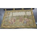 A 20th Century tapestry wall hanging depicting a rococo scene of figures on a lakeside balcony,