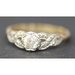 A gold and diamond set single stone ring, mounted with a cushion shaped diamond, detailed '18ct