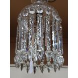 An early 20th Century cut clear glass ceiling light, hung with a circlet of spear drops, diameter