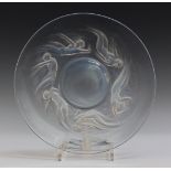 A Lalique clear and opalescent glass Ondines pattern circular plate, number 3003, the underside