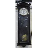 A late 19th Century simulated rosewood cased Vienna style wall timepiece, the two piece enamel