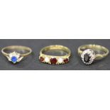 A 9ct gold, sapphire and diamond set oval cluster ring, a 9ct gold, blue and colourless gem set