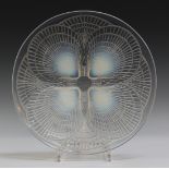 A Lalique clear, frosted and opalescent glass Coquilles pattern circular dish, number 3009, the